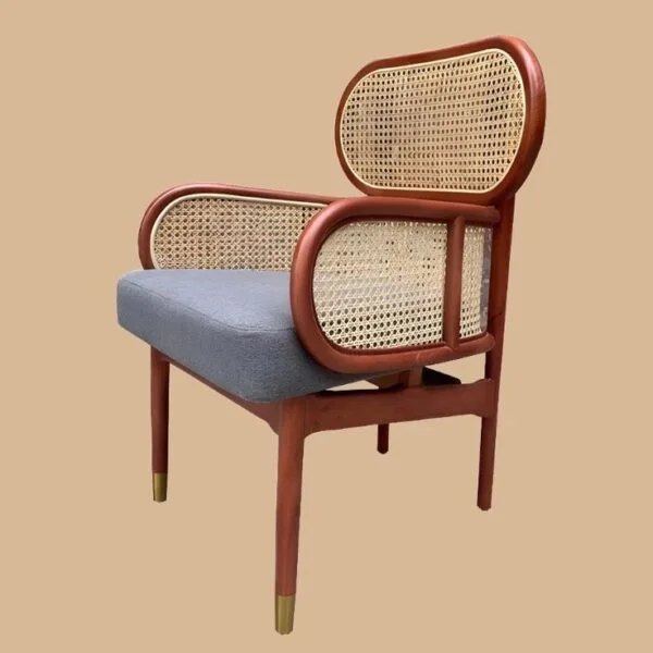 Butterfly rattan chair with woven rattan backrest and solid wood frame handcrafted Indonesia furniture