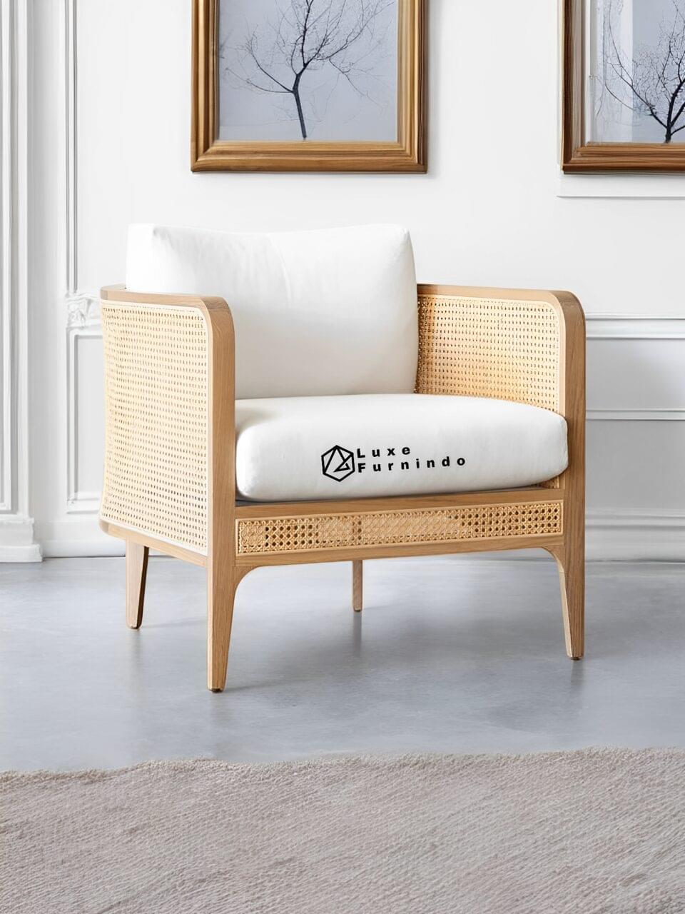 Scandinavian-style lounge chair with rattan back, natural wood frame, and cream cushion -- Indonesia Furniture.