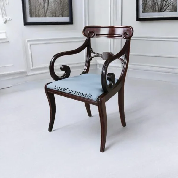 Classic dining chairs. Empire-style antique armchair with mahogany finish and curved scroll arms -- Indonesia Furniture