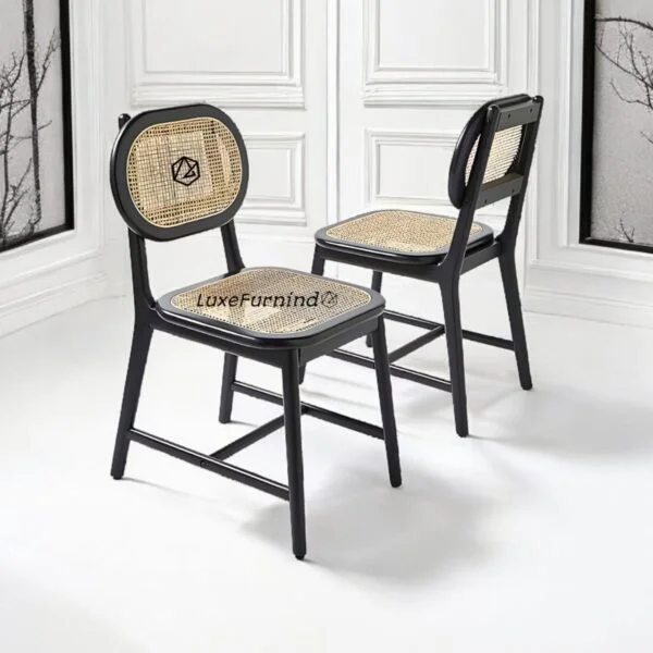 Rattan dining chair. Classic rattan dining chair with black wooden frame and woven cane seat – perfect for luxury interiors
