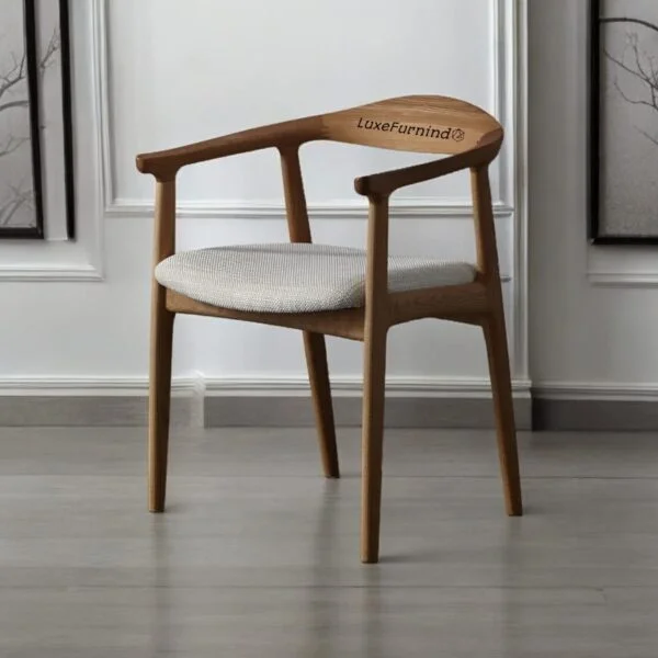Scandinavian-style wooden armchair with curved backrest and upholstered seat, handcrafted in Indonesia - Indonesia Furniture Supplier