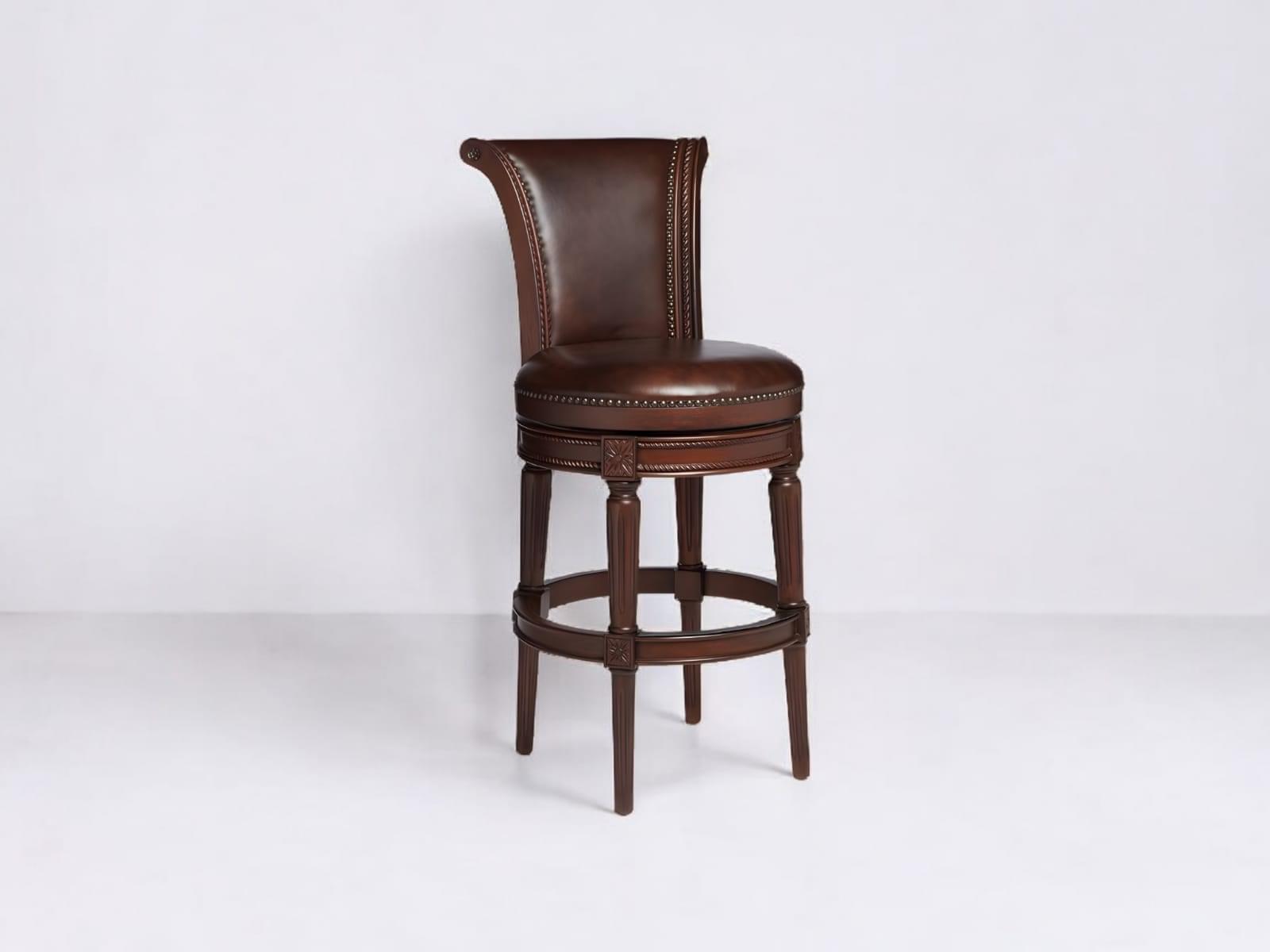 WhatsApp Image 2025-02-17 at 13.38.48 Antique bar stools. Classic wooden bar stool with premium leather upholstery, featuring a swivel base and elegant hand-carved details.