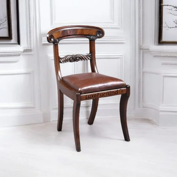 Antique-style Regency dining chair with curved backrest and brown leather seat, handcrafted in Indonesia - Indonesia Furniture Supplier.