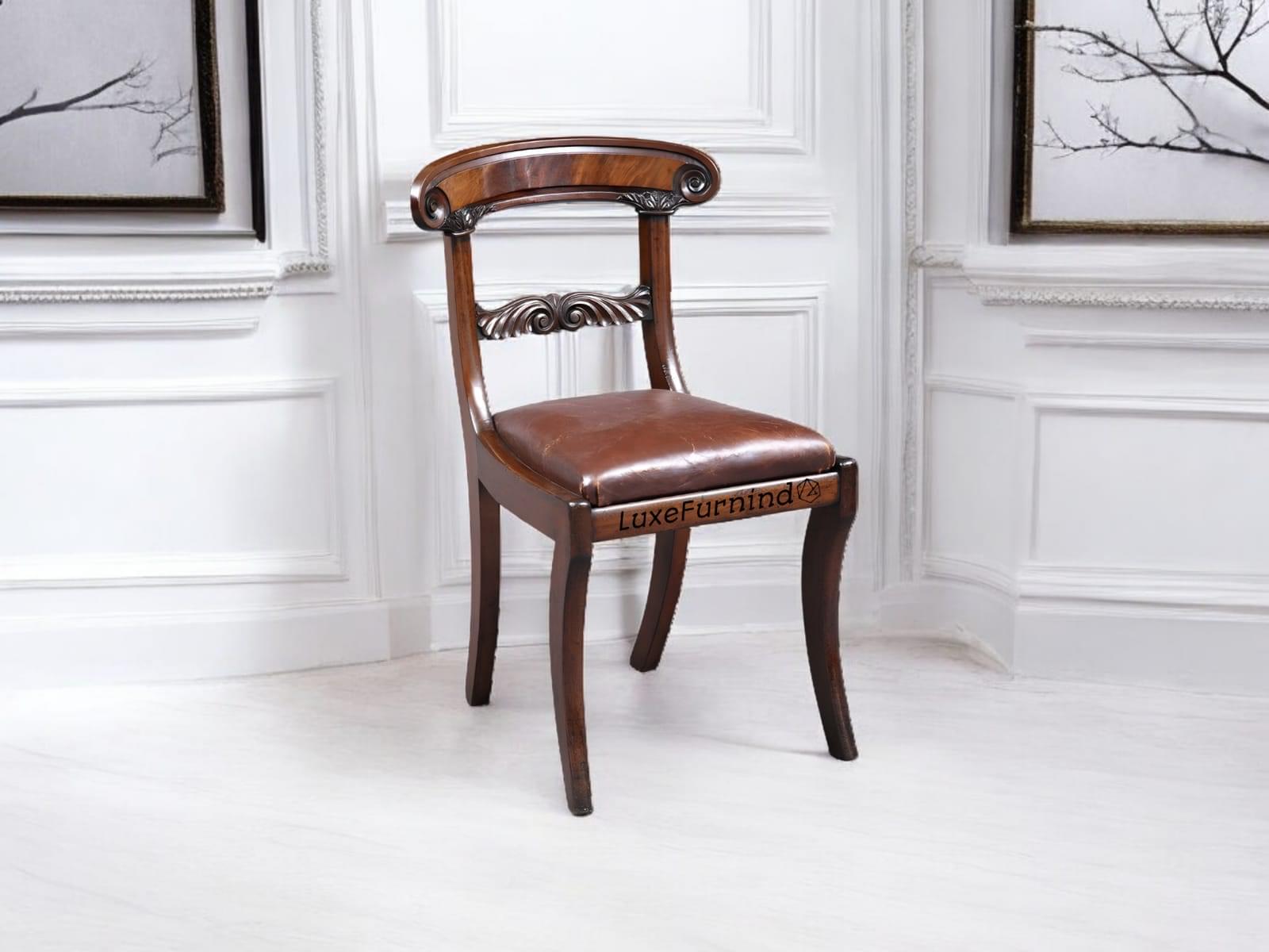 Antique-style Regency dining chair with curved backrest and brown leather seat, handcrafted in Indonesia - Indonesia Furniture Supplier.