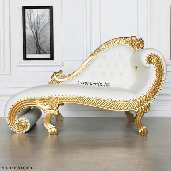 Luxuriously carved imperial style lazy sofa with gold finish and elegant white upholstery.