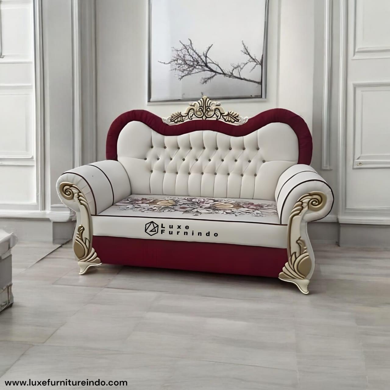 WhatsApp Image 2025-02-25 at 12.52.56 Luxury royal sofa, Classic Jepara carved chaise lounge sofa from solid teak wood with luxurious floral patterned fabric, elegant design for a living room or classic interior.